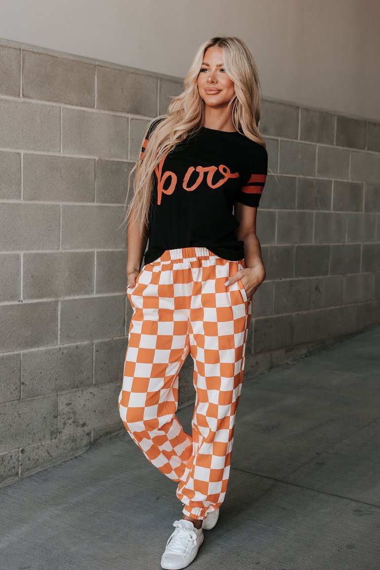 Orange checkered joggers on sale