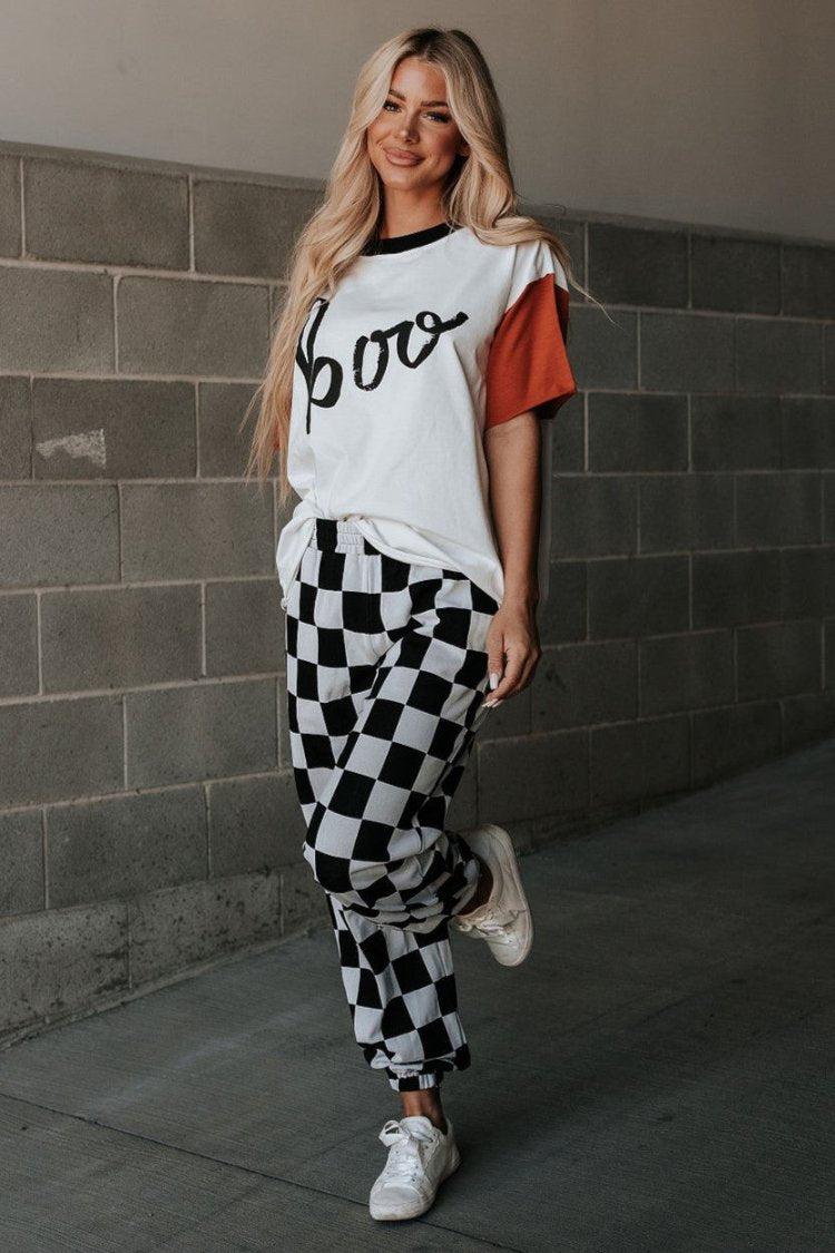 Black and white checkered joggers on sale